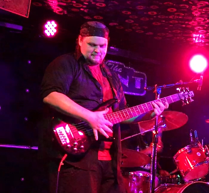 James Michael House playing bass